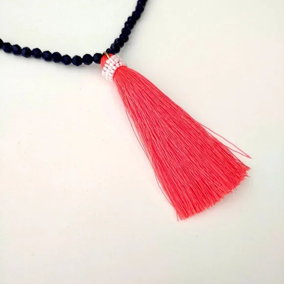 Navy beaded necklace with florescent orange thread tassel - Picture 11 of 12